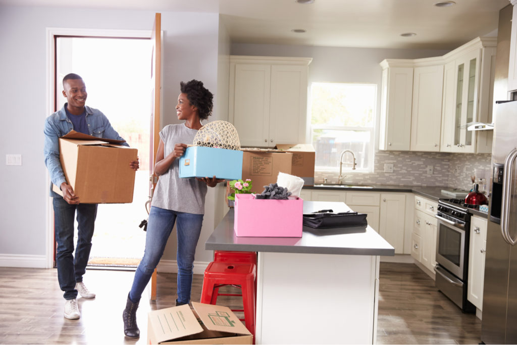 Young Couple Moving Apartments