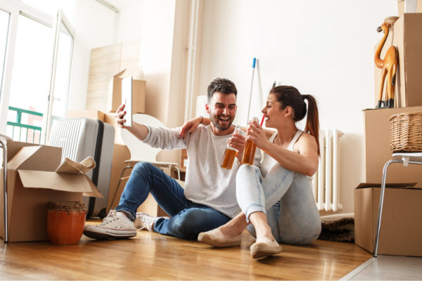 Young Couple After Moving Into First Home